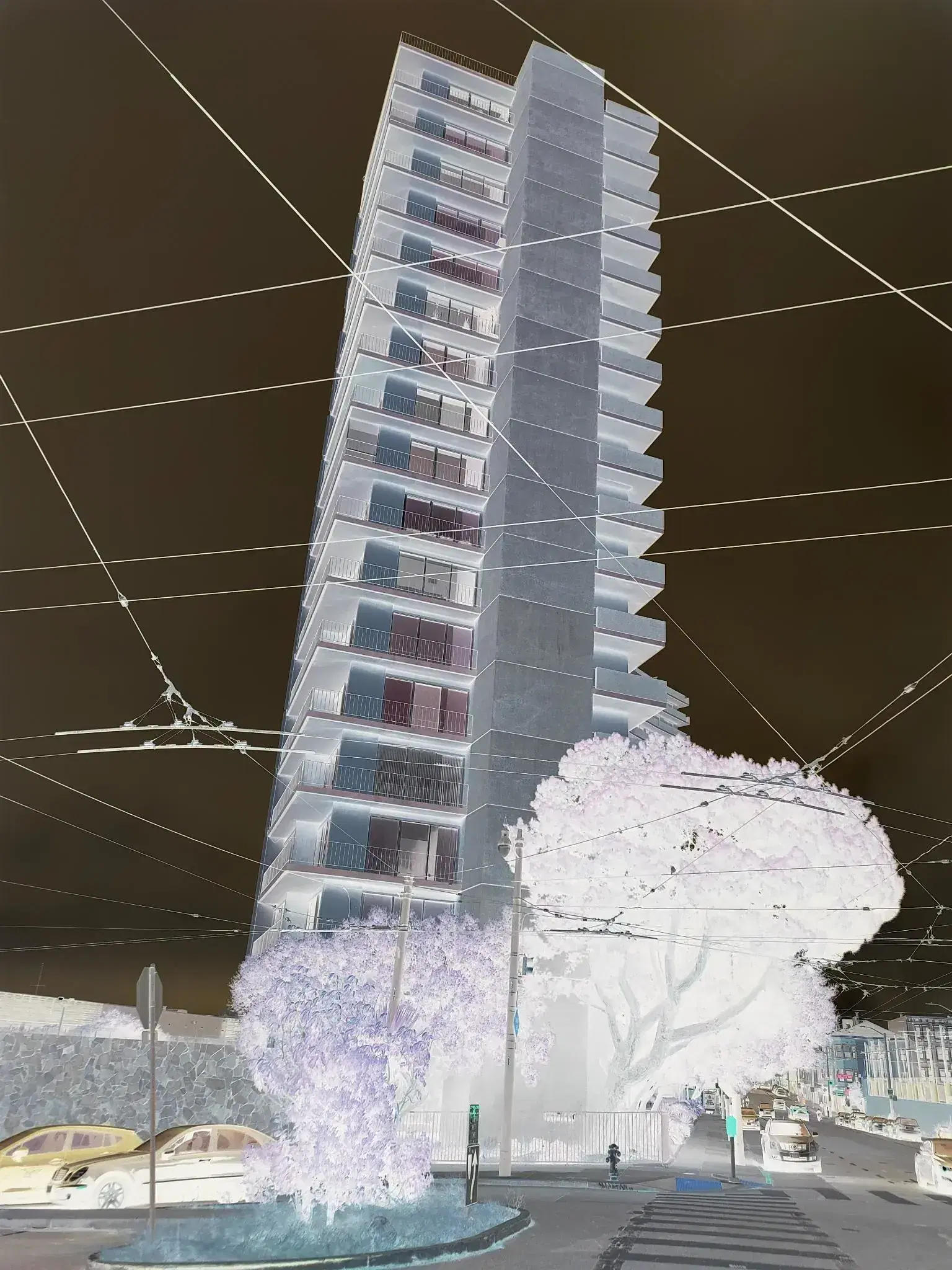 tall building with segmented layers and slew of cables, portraying metaphor of Full-stack Web Development.
